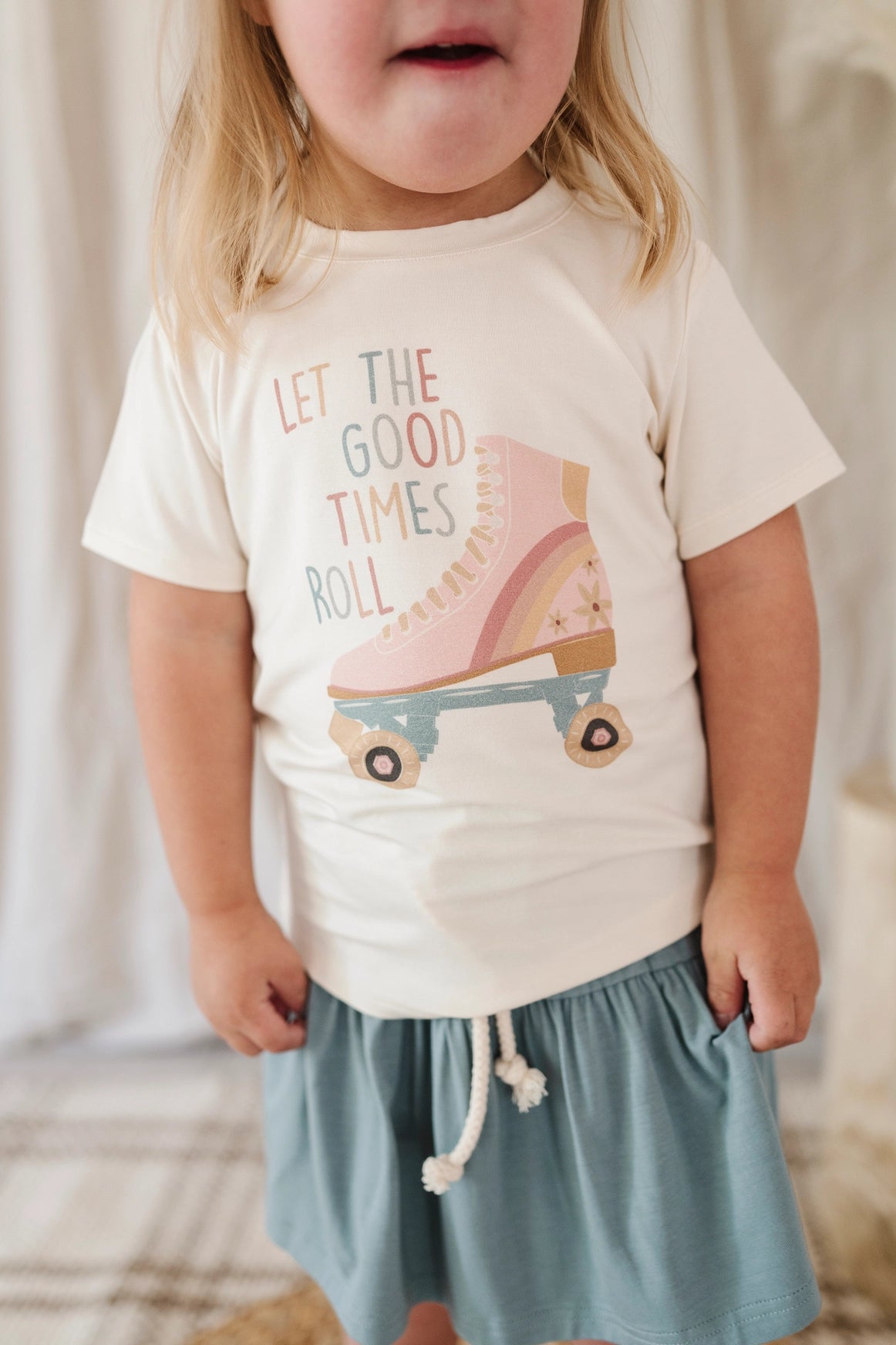Little girl wearing Babysprouts Clothing Company Girl's Bamboo Tee - Let the Good Times Roll